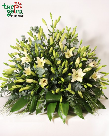 Funeral arrangement with lilies