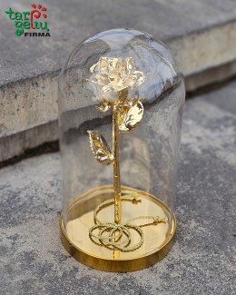 Golden rose in a flask