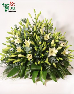 Funeral arrangement with lilies