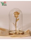 Golden rose in a flask